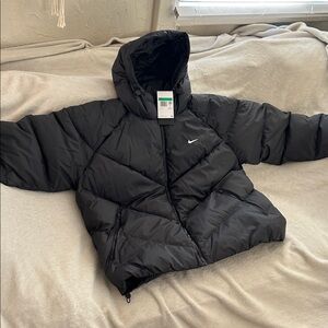 Nike Women Black Puffer Jacket
XL